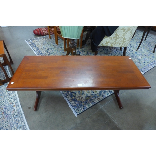 86 - A teak rectangular coffee table