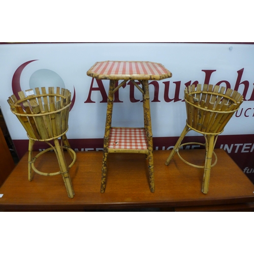 89 - A Victorian bamboo side table and two bamboo plant stands