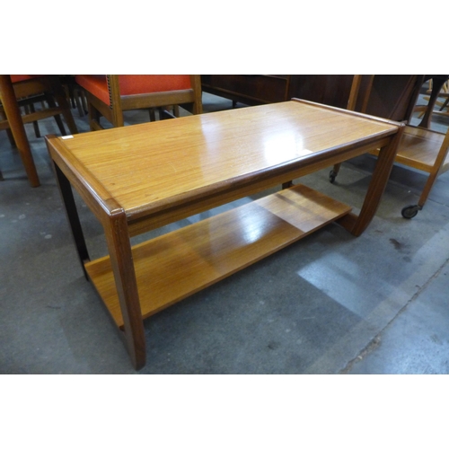 92 - A teak coffee table