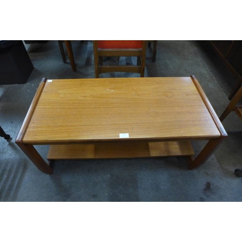 92 - A teak coffee table