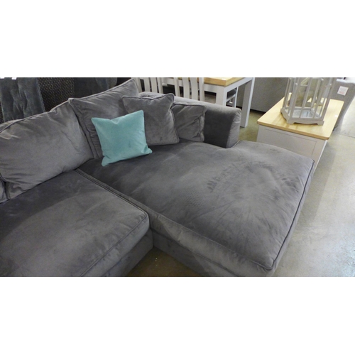 1304 - A designer steel grey upholstered corner sofa/chaise (loose underliner)