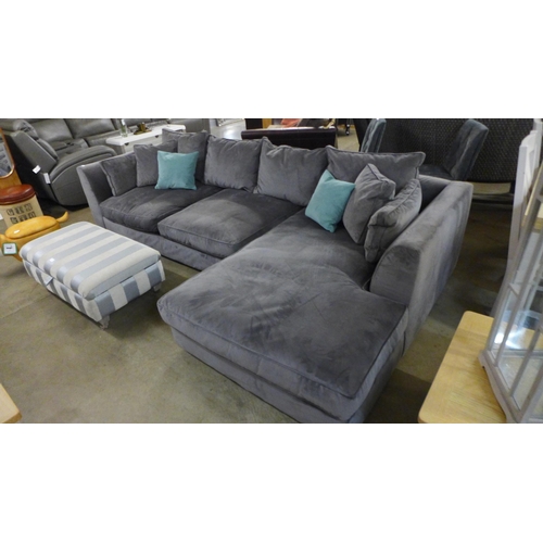 1304 - A designer steel grey upholstered corner sofa/chaise (loose underliner)