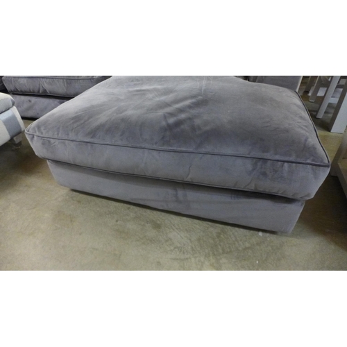 1304 - A designer steel grey upholstered corner sofa/chaise (loose underliner)