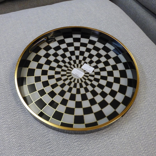 1361 - A small circular black and white chequers design tray, 44cms