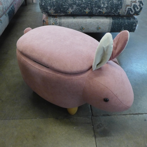 1369 - A pink fabric rabbit footstool with storage