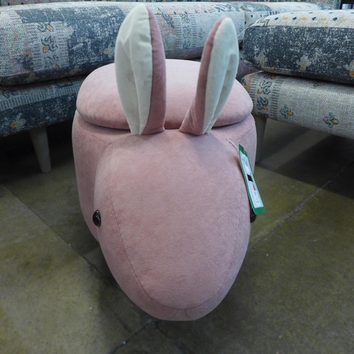 1369 - A pink fabric rabbit footstool with storage