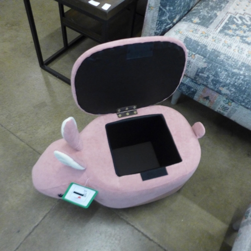 1369 - A pink fabric rabbit footstool with storage