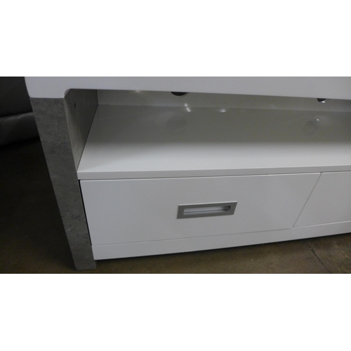 1456 - A modern designer white two drawer TV stand (slightly marked)