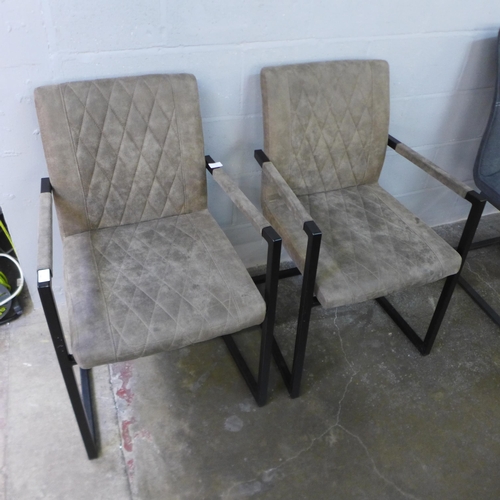 1481 - A pair of leather effect side chairs with industrial style legs