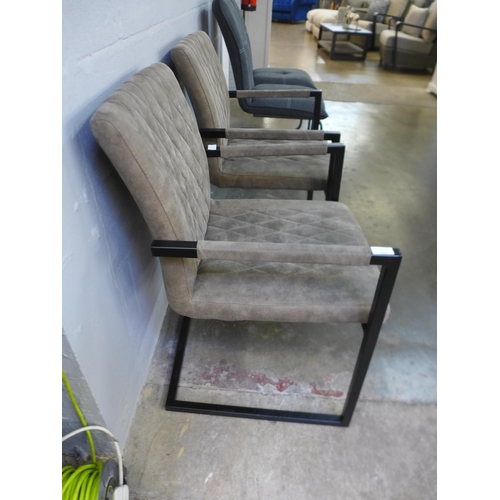 1481 - A pair of leather effect side chairs with industrial style legs