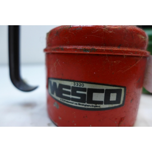 2085 - 2 Vintage Westco oil bottles