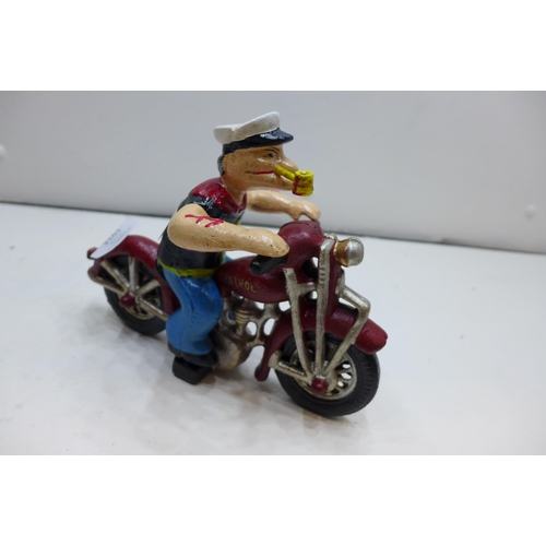 2101 - Cast Popeye figure on motorcycle * This lot is subject to VAT