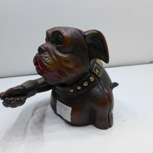 2111 - Cast metal bulldog moneybox *pull arm to open mouth for coin. This lot is subject to VAT