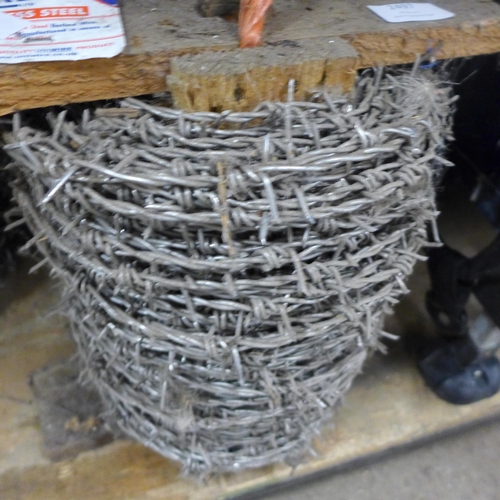 2497 - Roll of galvanised barbed wire