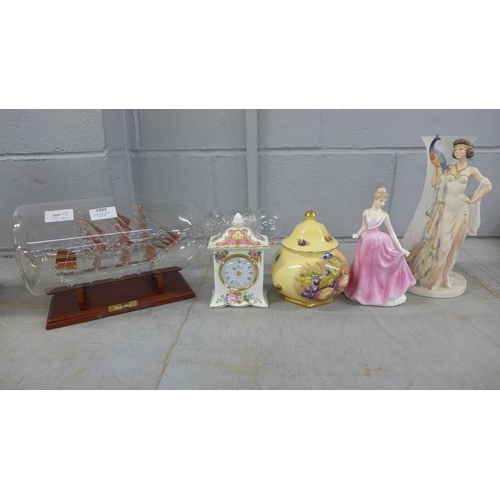 1202 - A Royal Albert clock, an Aynsley lidded vase, a figure/vase and a ship in a bottle on stand  **PLEAS... 