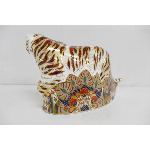 607 - A Royal Crown Derby paperweight, modelled as a Bengal Tiger (20cm x 13cm), signed on the base by Joh... 