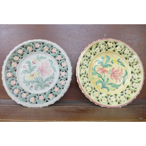 615 - Two mid 20th Century hand painted pierced plates, 34cm