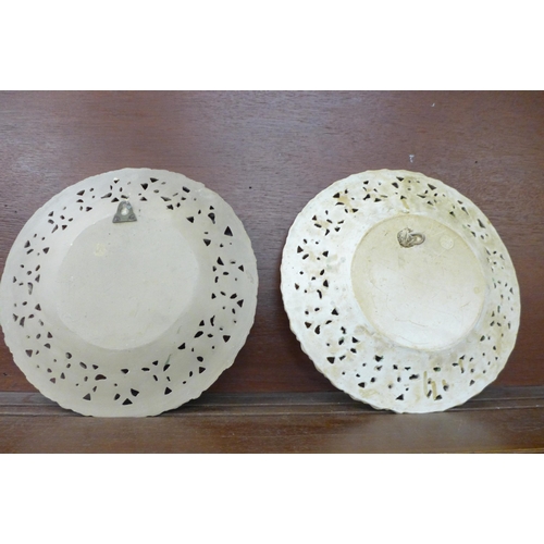 615 - Two mid 20th Century hand painted pierced plates, 34cm