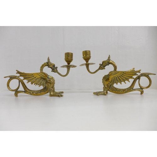 619 - A pair of brass dragon chamber sticks, length 21cm