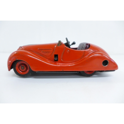 630 - An early 20th Century German clockwork tin-plate model car, Schuco Examico 4001