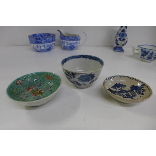 651 - An oriental blue and white tea bowl, small chip on the rim, a Spode cream and sugar, a Wood & Sons 1... 