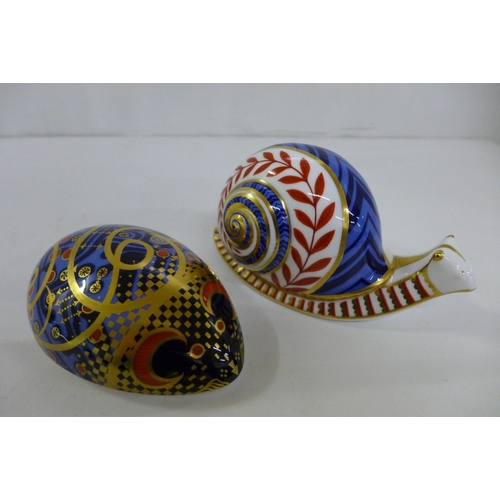 655 - Three Royal Crown Derby Paperweights - Snail decorated in the classic spiral design/shell pattern an... 