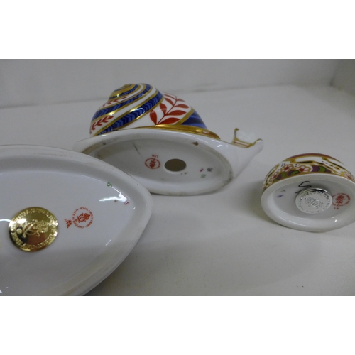 655 - Three Royal Crown Derby Paperweights - Snail decorated in the classic spiral design/shell pattern an... 