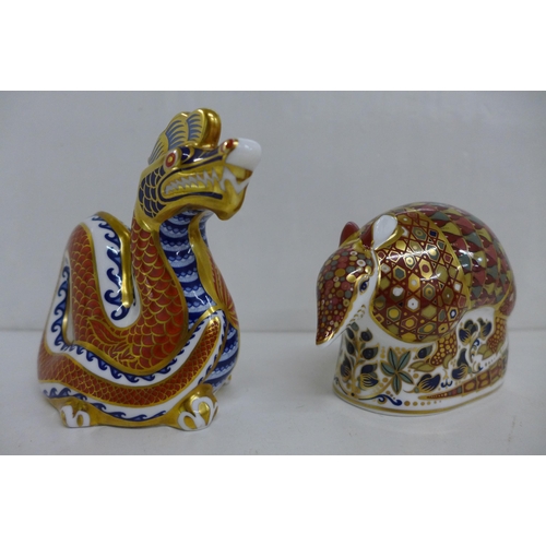 657 - Two Royal Crown Derby Paperweights - Armadillo and Dragon, decorated in the Imari pallet, both with ... 