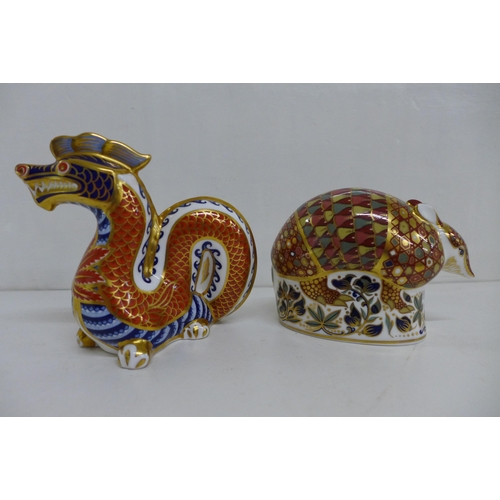 657 - Two Royal Crown Derby Paperweights - Armadillo and Dragon, decorated in the Imari pallet, both with ... 