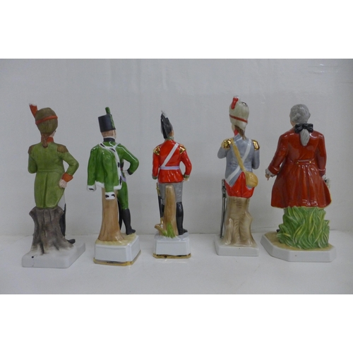 676 - A model of George III and four figures in military uniform