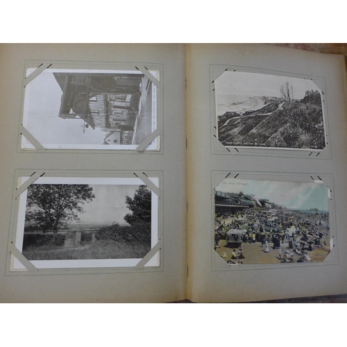 682 - Two albums of early 20th Century postcards