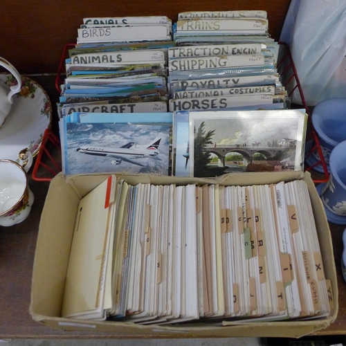 692 - A large quantity of late 20th Century postcards, arranged with dividers