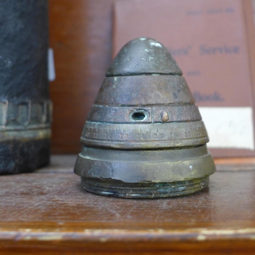 697 - An artillery shell, etc.