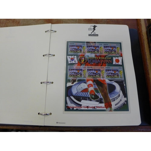 701 - Two albums with complete collection of The 2002 World Cup Collection stamp first day covers