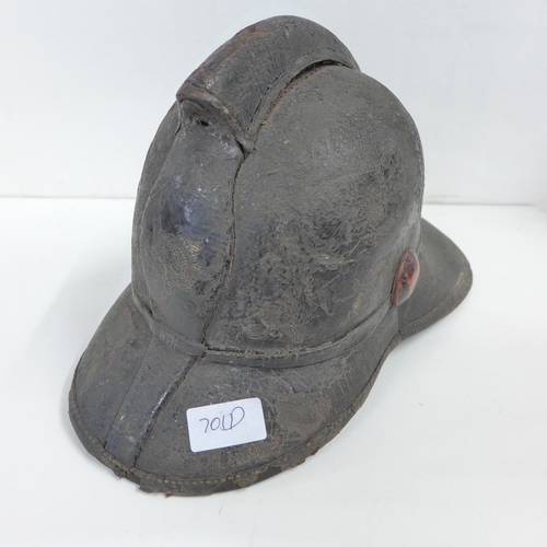 701d - A Victorian fireman's leather-shell helmet