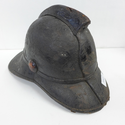 701d - A Victorian fireman's leather-shell helmet