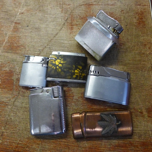 703 - Cigarette lighters and accessories