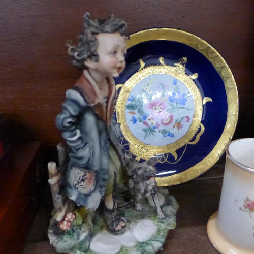 705 - A Capodimonte figure Boy Tramp, a continental blue/gilt floral decorative plate, two Midwinter flora... 