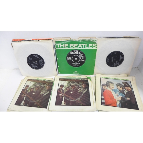 720 - Twenty-five The Beatles singles