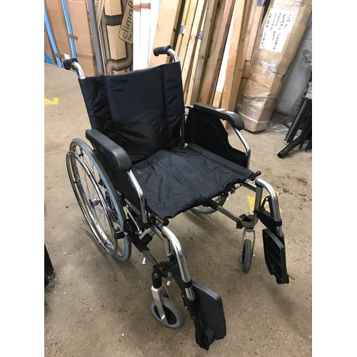 2490 - Black folding wheelchair, large wheels with hand pull/push rails to wheels