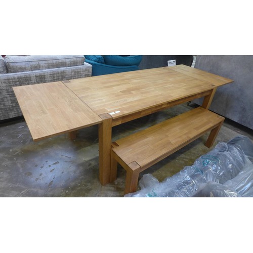 1999 - A Hongfa oiled oak dining table 160cm and a pair of Hongfa benches, 145cms - leaves may need attenti... 