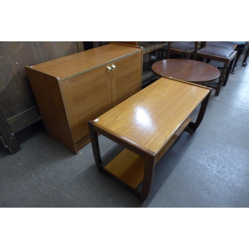 104b - A teak two door cabinet and a coffee table
