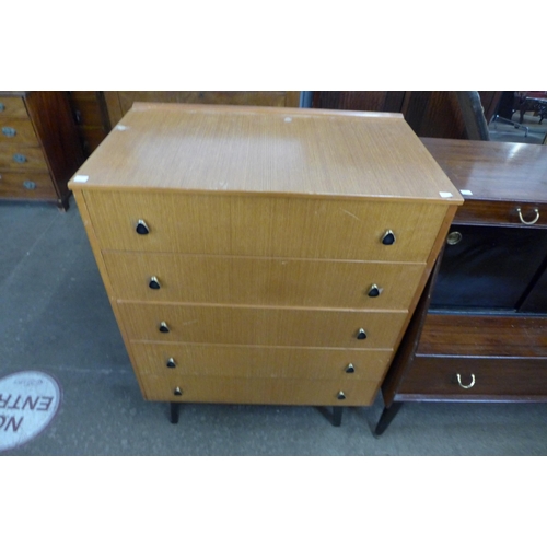 105 - A teak bureau and a chest of drawers