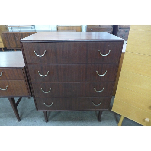 69 - A Meredew tola wood chest of drawers