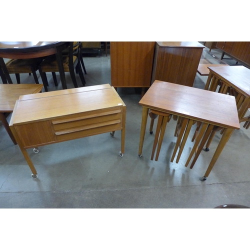82 - A Danish teak nest of tables and a telephone table