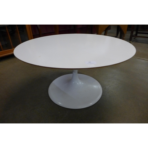 88 - An Arkana style white laminate circular coffee table