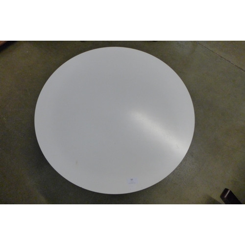 88 - An Arkana style white laminate circular coffee table