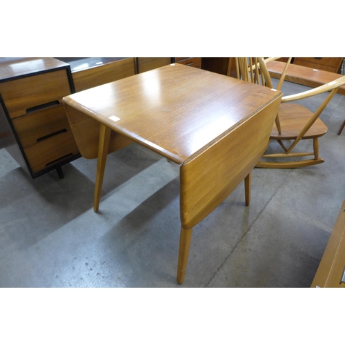 93 - An Ercol Blonde elm and beech Windsor drop-leaf table