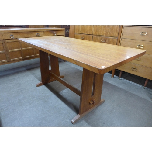 97 - A Reynolds of Ludlow teak refectory table
