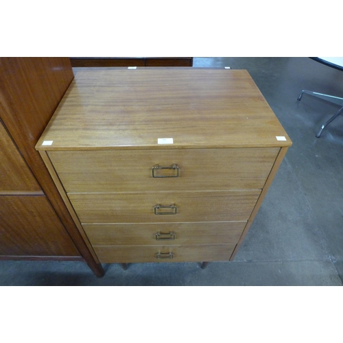 99 - A teak chest of drawers